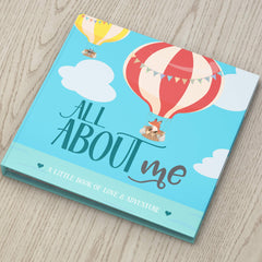 RubyRoo Memory Book inside pages feature milestone prompts and photo spaces for growing memories.