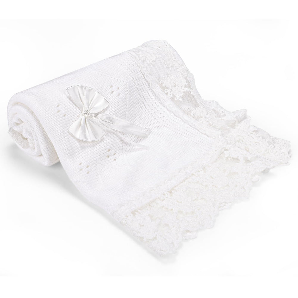 Runeaoys white lace knit blanket adds elegant detail for newborns and outings.