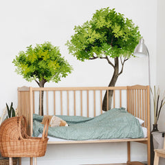 Runtoo peel-and-stick wall mural with green plants brightens living spaces.