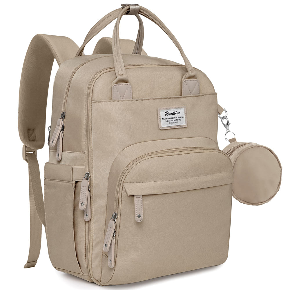 RUVALINO diaper bag backpack side view showing roomy pockets for quick bottle access.