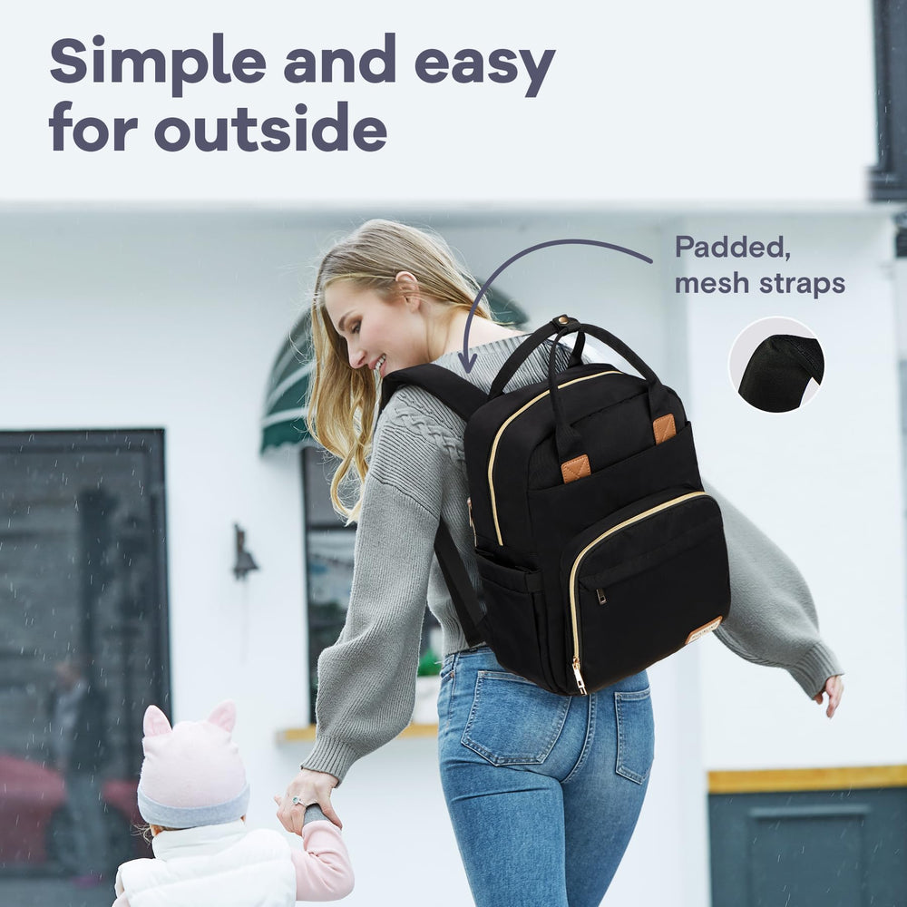 RUVALINO diaper bag backpack stroller-attachment demonstrates versatile parenting on errands.