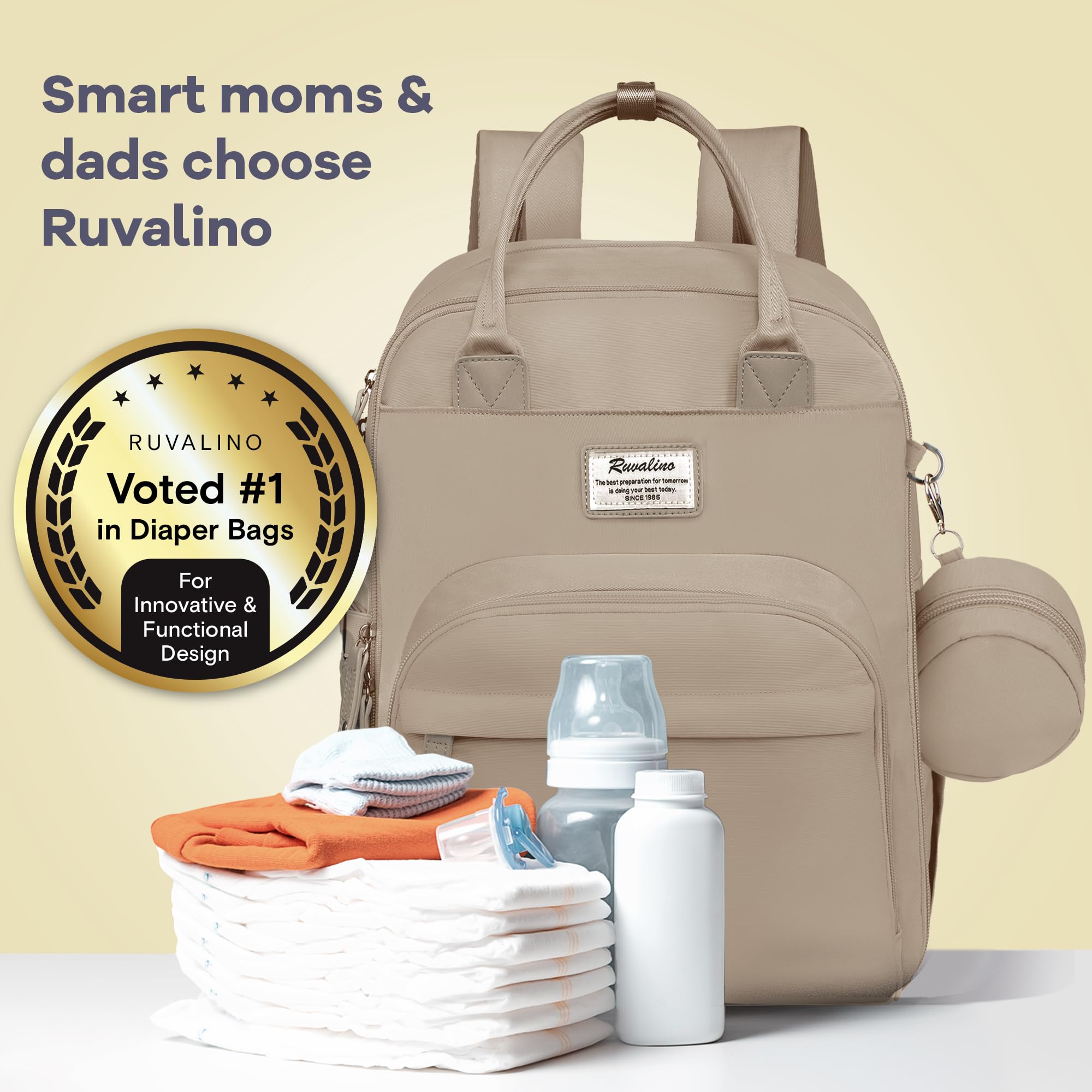 RUVALINO diaper bag stroller attachment option for hands-free travel.