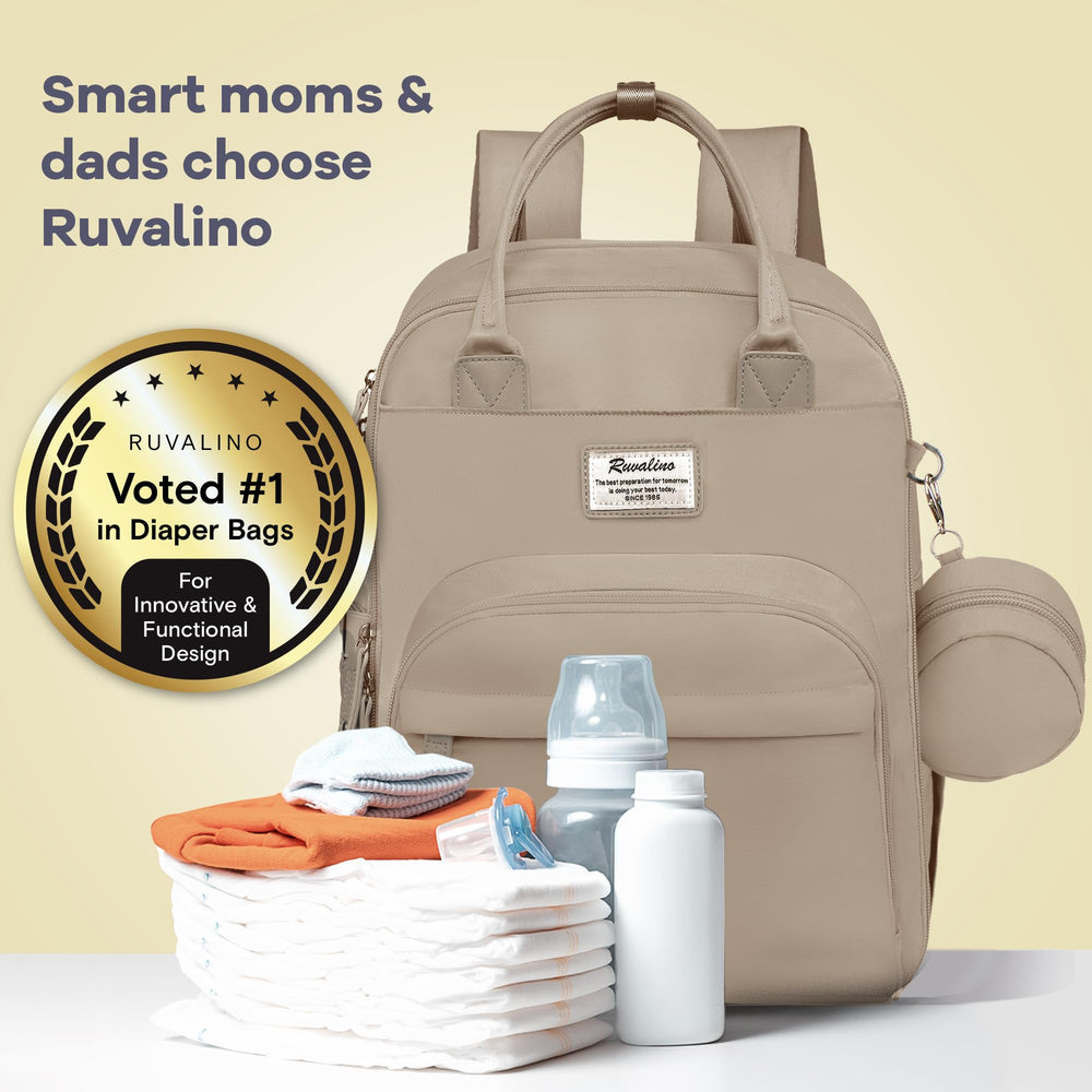 RUVALINO diaper bag stroller attachment option for hands-free travel.