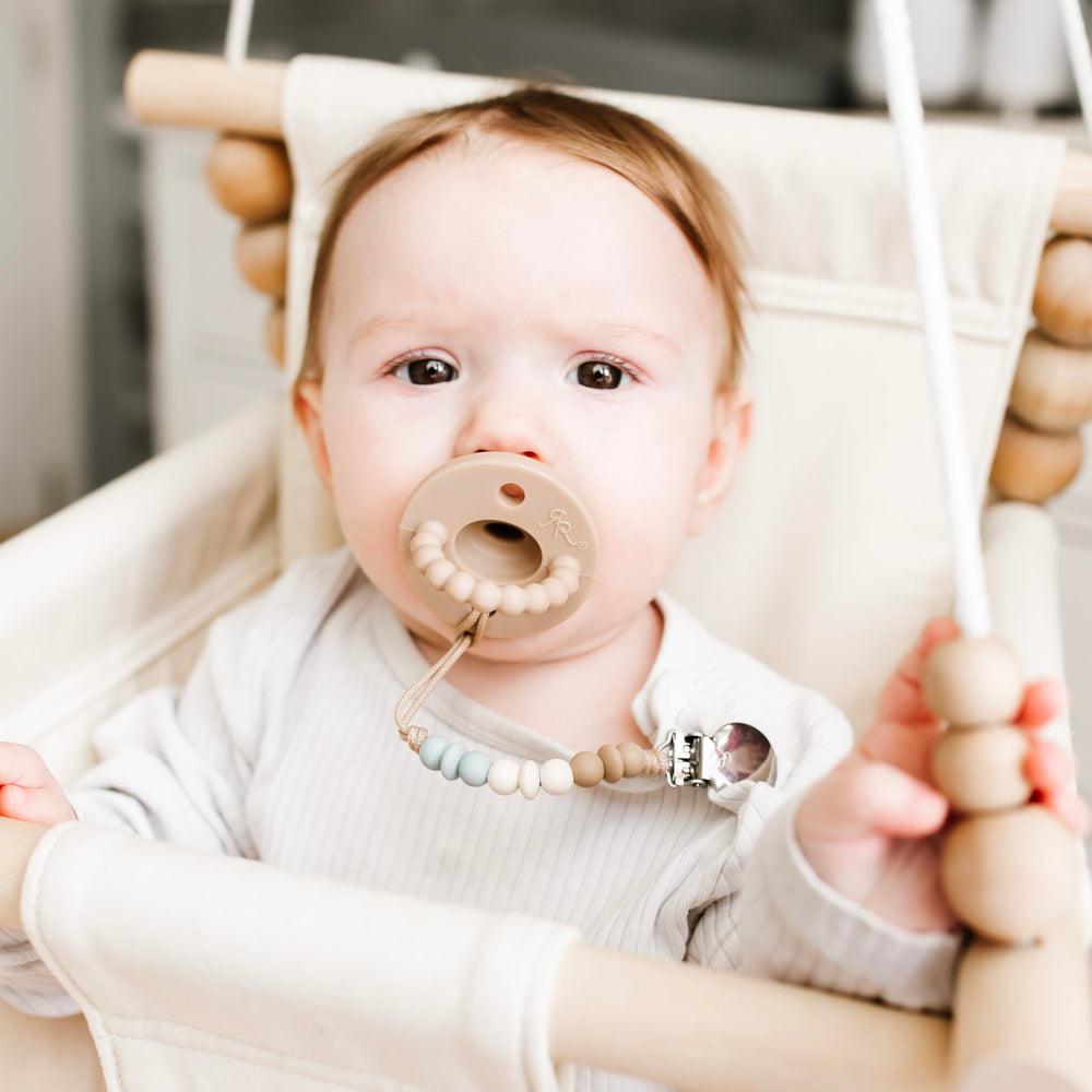 Ryan & Rose Cutie PAT baby comfort with massaging teether aids soothing, convenient relief for teething.