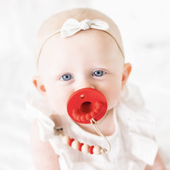 Ryan & Rose Cutie PAT Slant Red teether handle enabling easy grasp