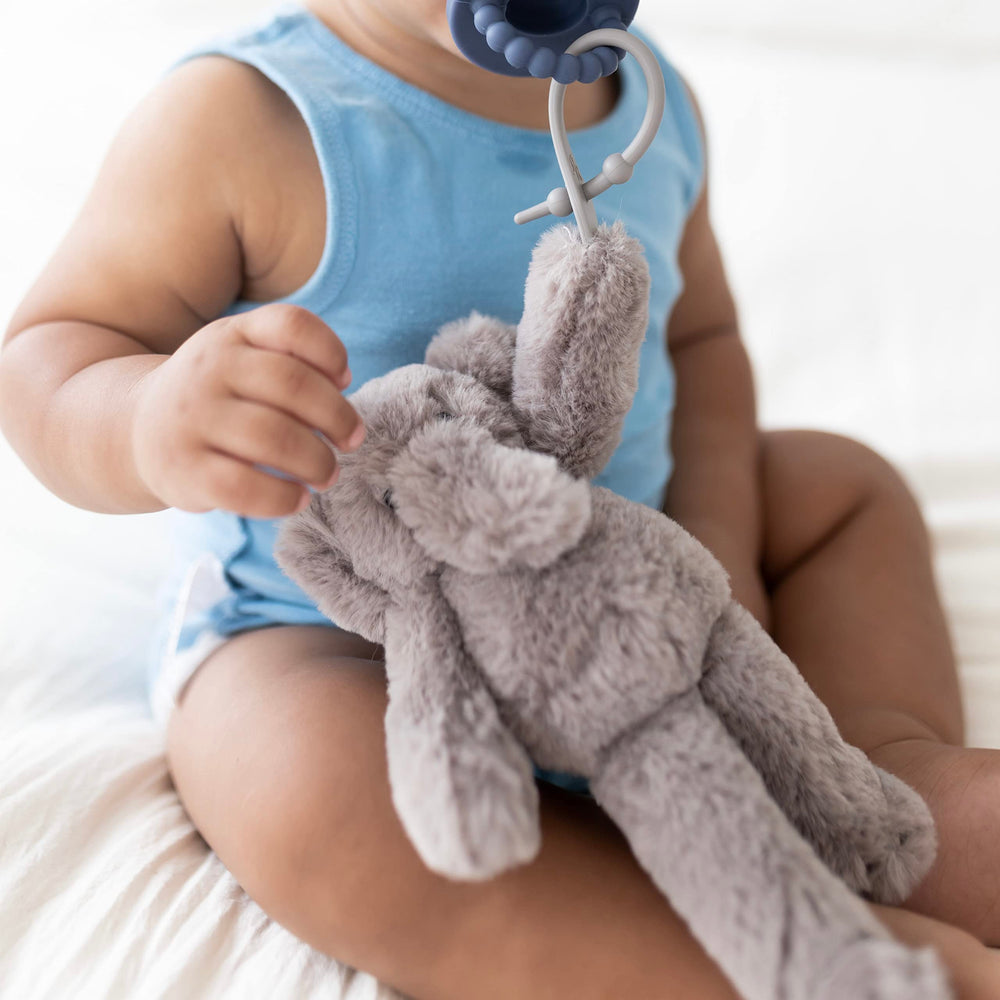 Ryan & Rose Cutie Cuddle Elephant pacifier attachment keeps essentials close.