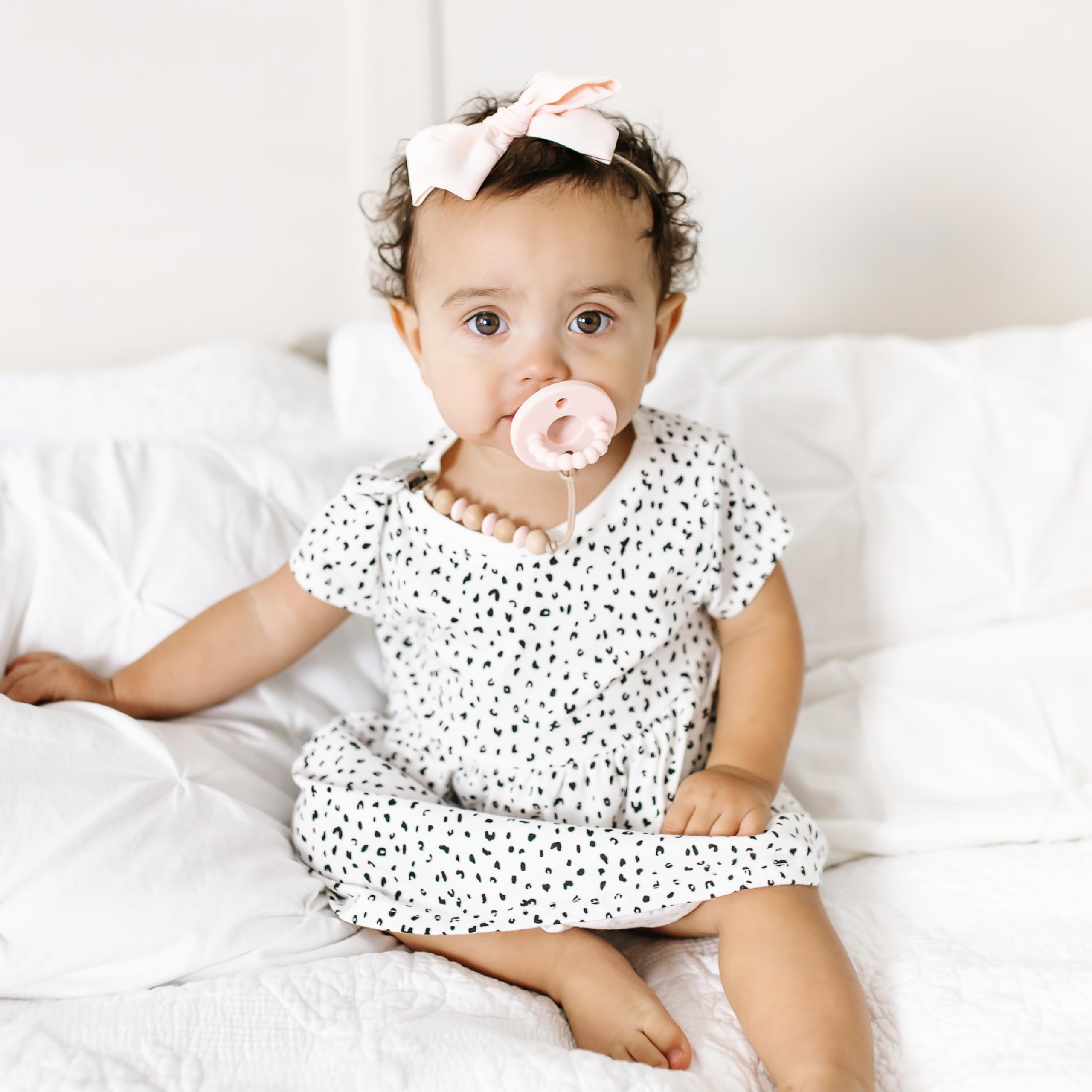 Ryan & Rose Cutie PAT Bliss teether ring providing massaging gums for teething moments