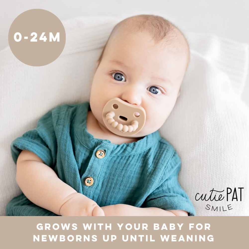 Ryan & Rose Cutie PAT Smile Dune teether image shows safe silicone for gum soothing