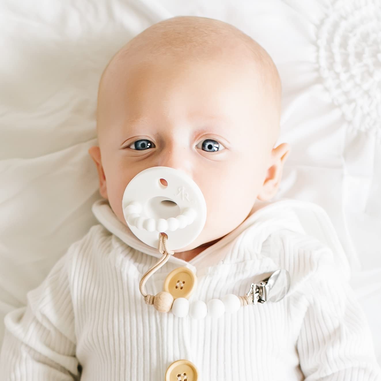 Ryan & Rose Cutie PAT Flat pacifier — dishwasher-safe top rack for quick cleanup.