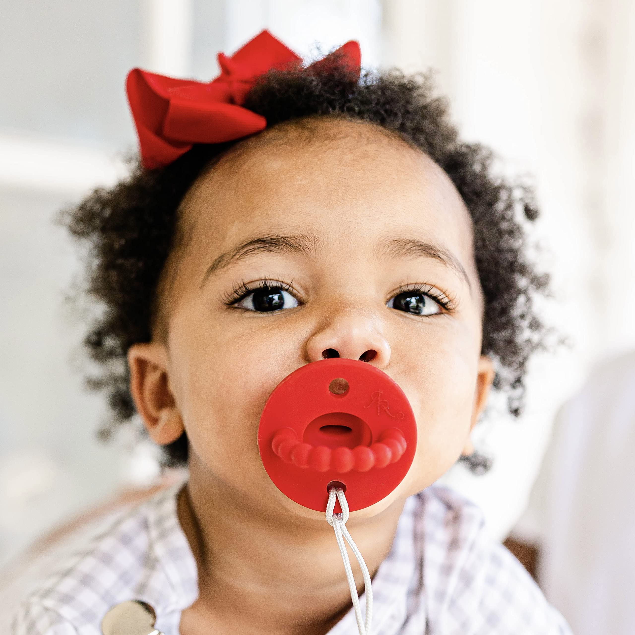 Ryan & Rose Cutie PAT silicone baby pacifier—100% medical-grade silicone safety.