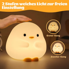 Rytinazzz Dudu Duck Night Light sits on a kid's bedside for gentle night help.