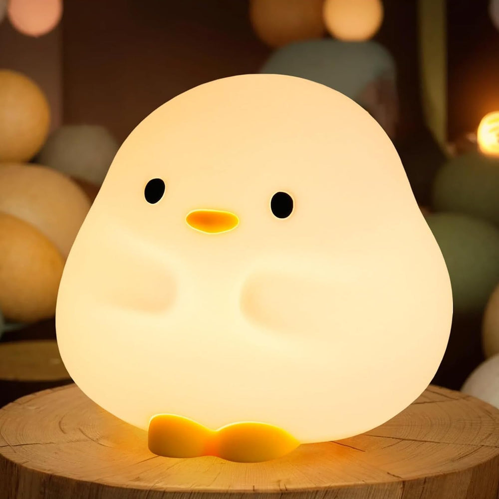 Rytinazzz Dudu Duck Night Light glows softly on a nursery table for bedtime comfort.
