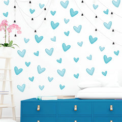 Sacinora blue love heart graphics create bedroom whimsy.