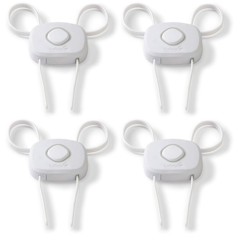 Safety 1st OutSmart Flex Lock decoy button closeup demonstrates childproofing with a convincing nonfunctional trigger.