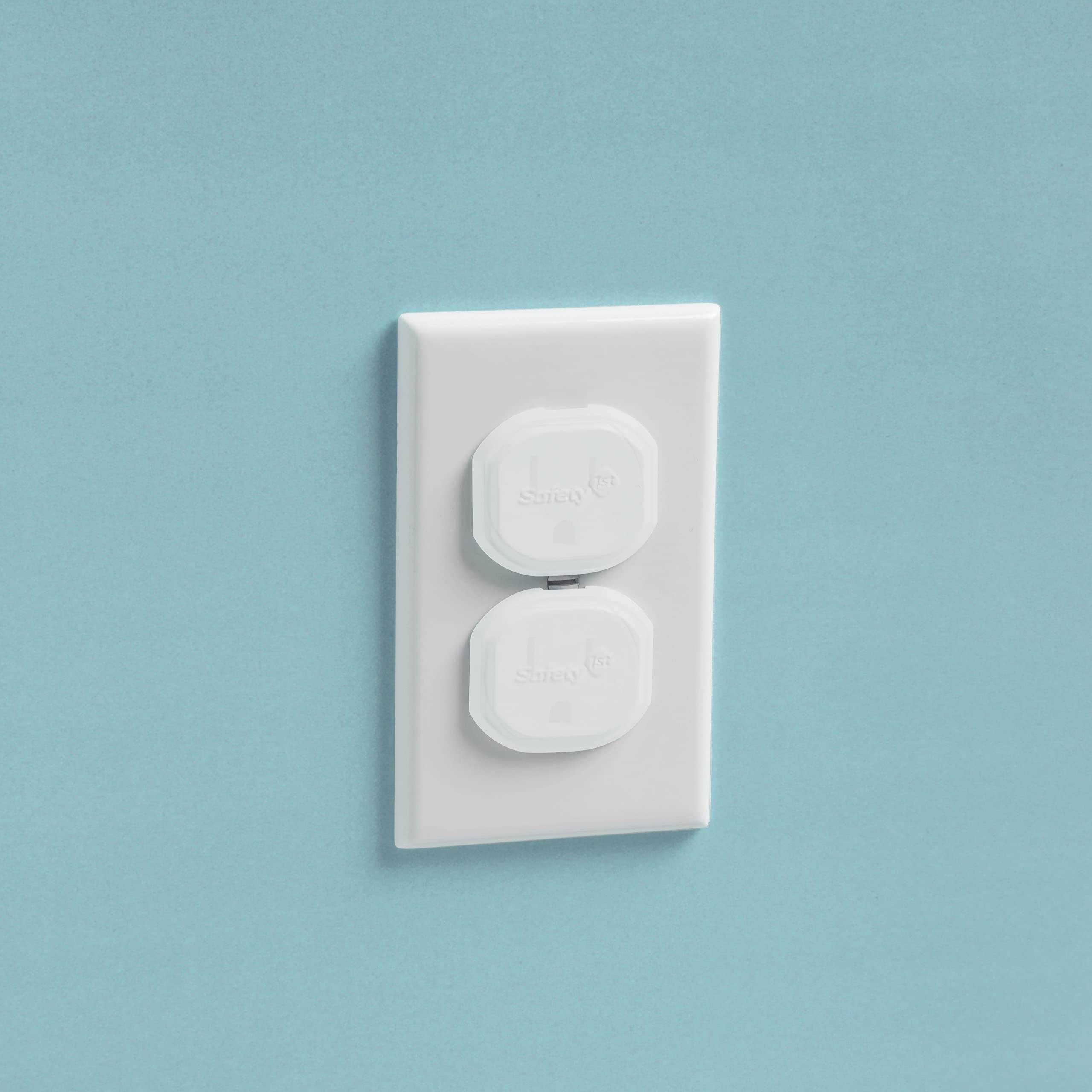 Safety 1st Secure Press plug protectors installed on outlet show a low-profile safety solution.
