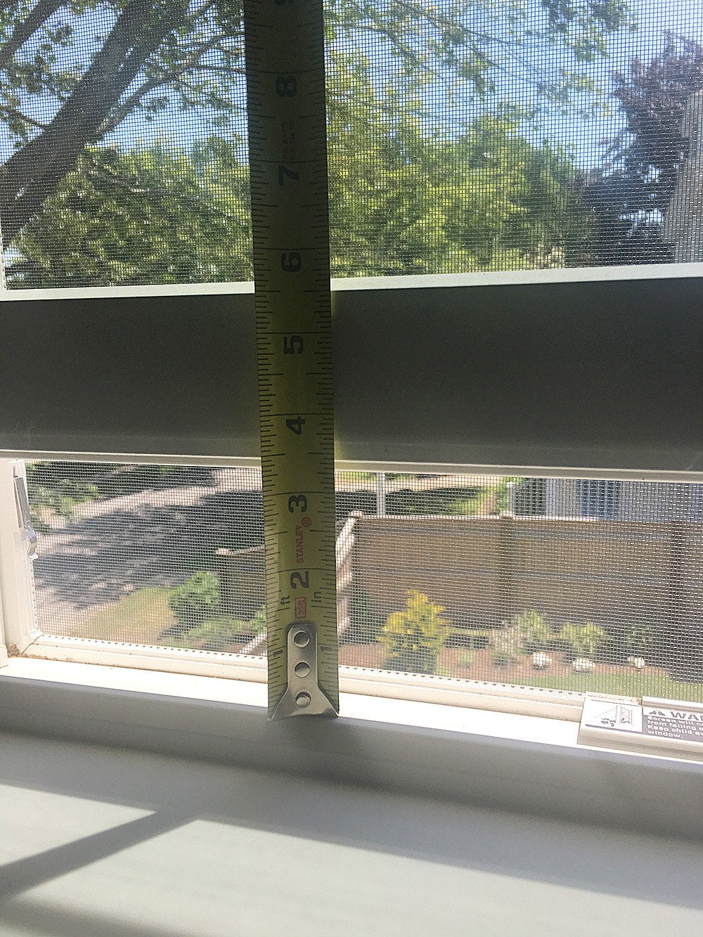 Safety Innovations childproof window locked during playtime session