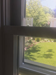 Safety Innovations glass door lock in action on a sliding door