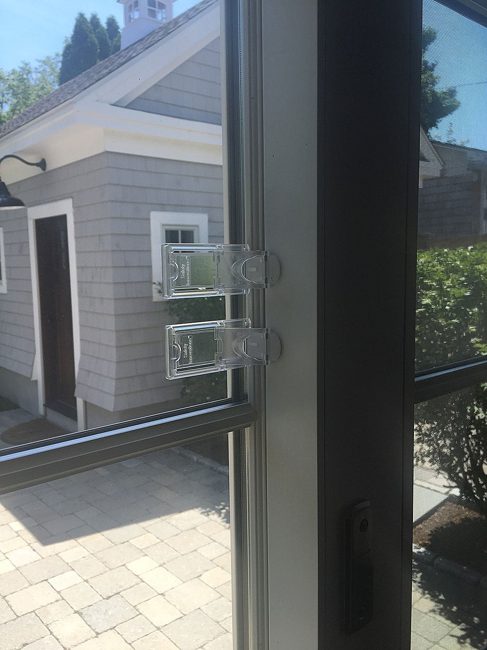 Safety Innovations shower door lock application on glass surface