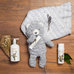 Safflower Safari diaper-area-application swirl on skin highlighting protective zinc-balm layer.