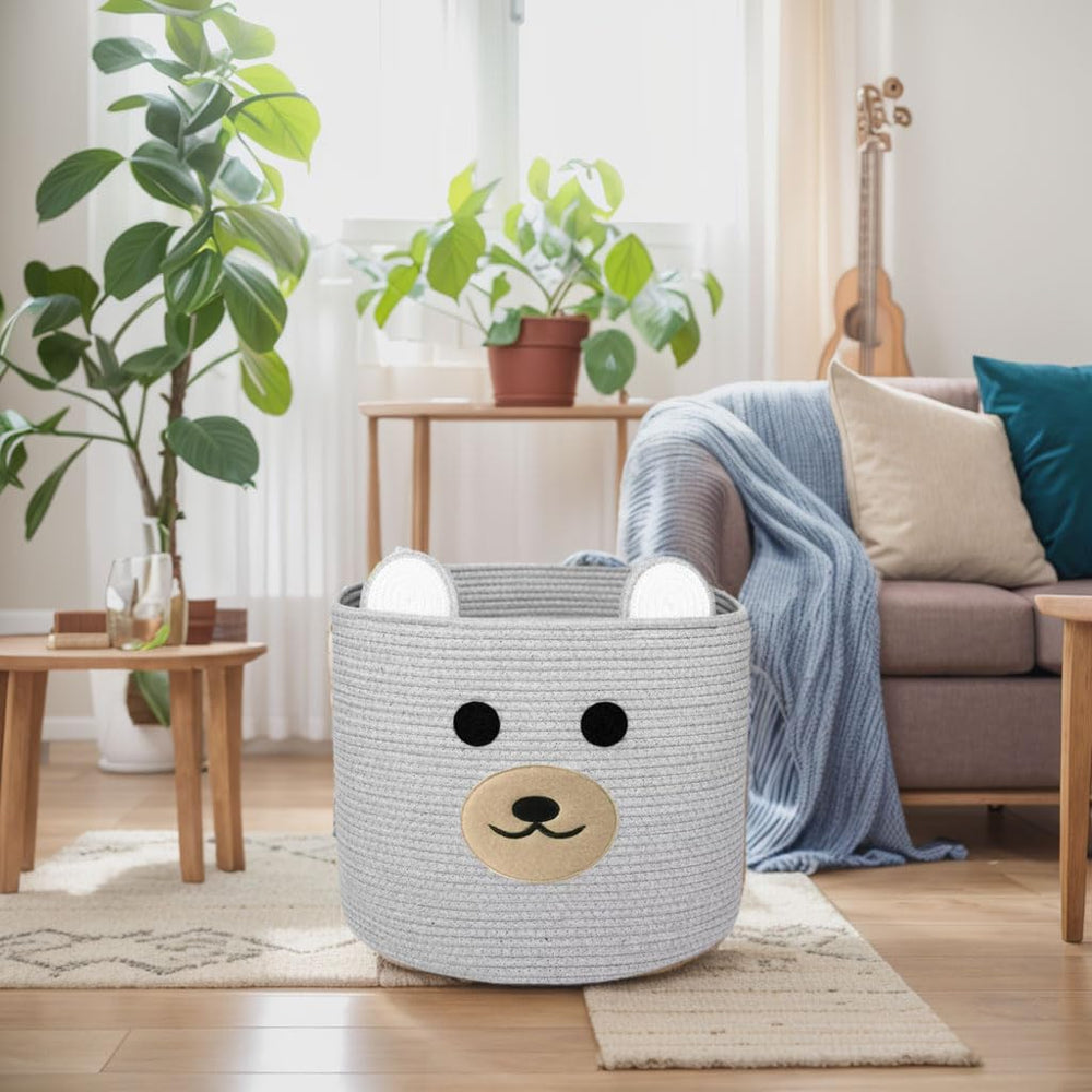 Saiiwnn Bear Laundry Basket in a living room used for organization