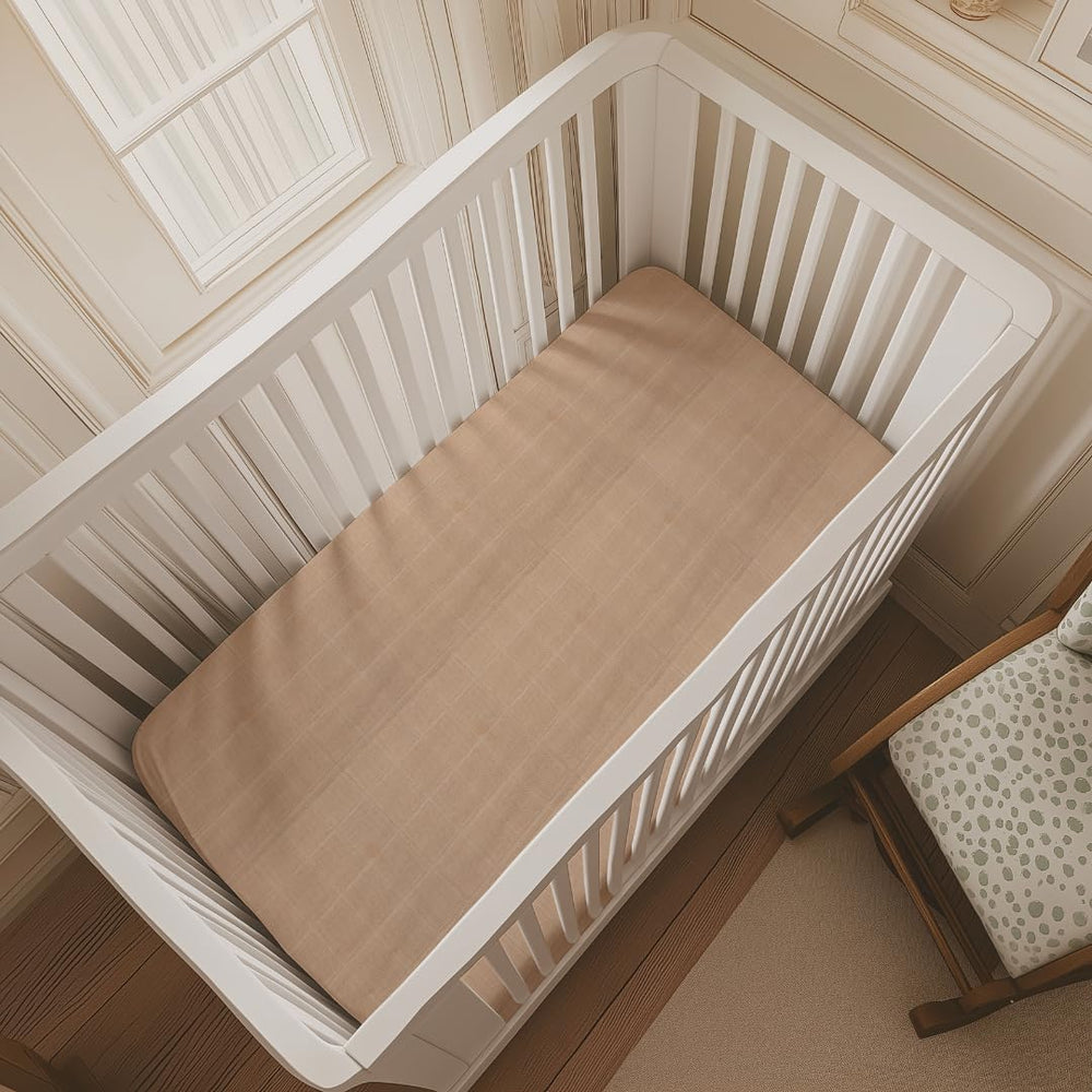 Salt Earth machine-washable crib sheets simplify laundry and quick nursery resets.