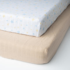 Salt Earth muslin crib sheet 2-pack with elastic edges ensures a secure, slip-free fit.