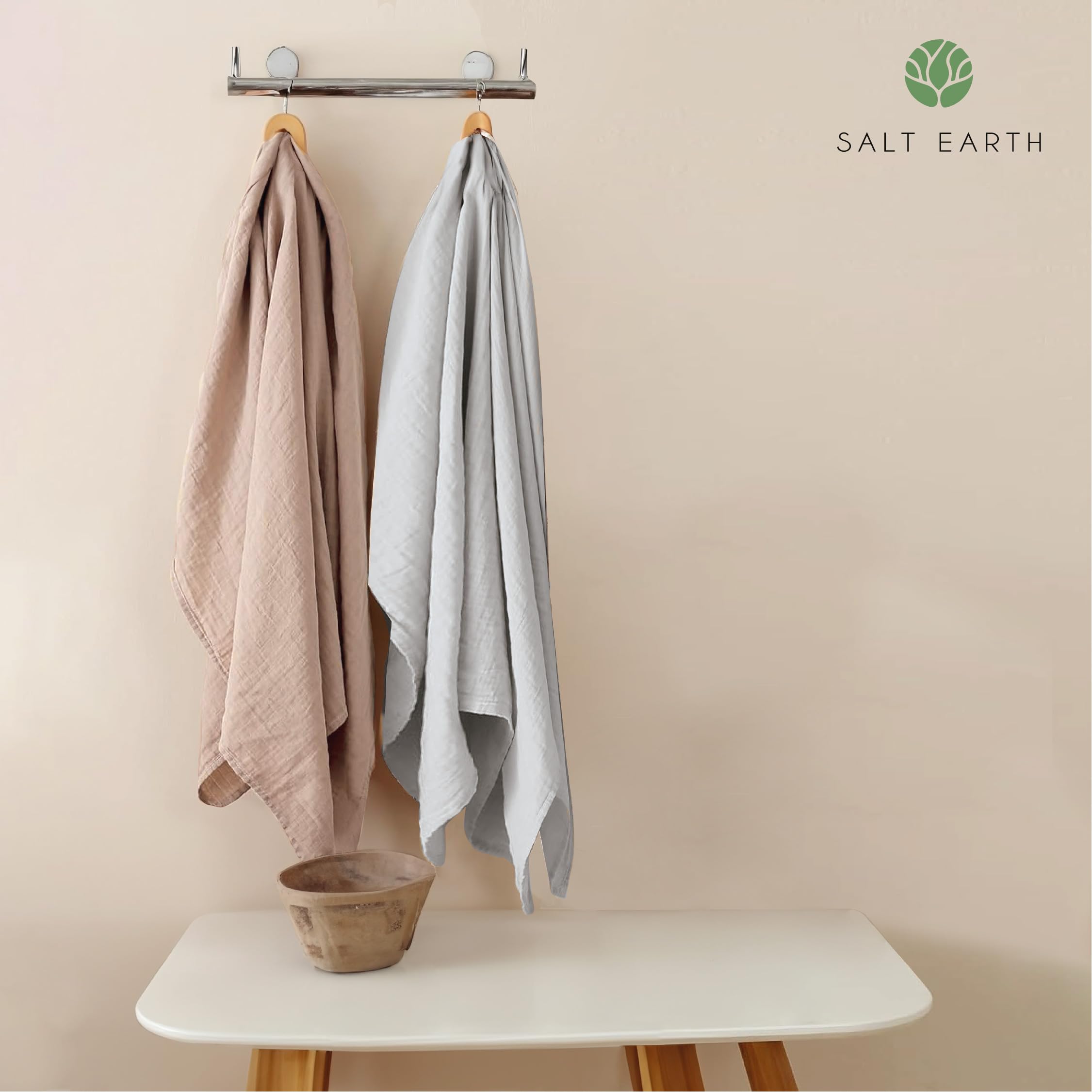 Salt Earth swaddle multiuse blanket used as burp cloth or nursing cover.