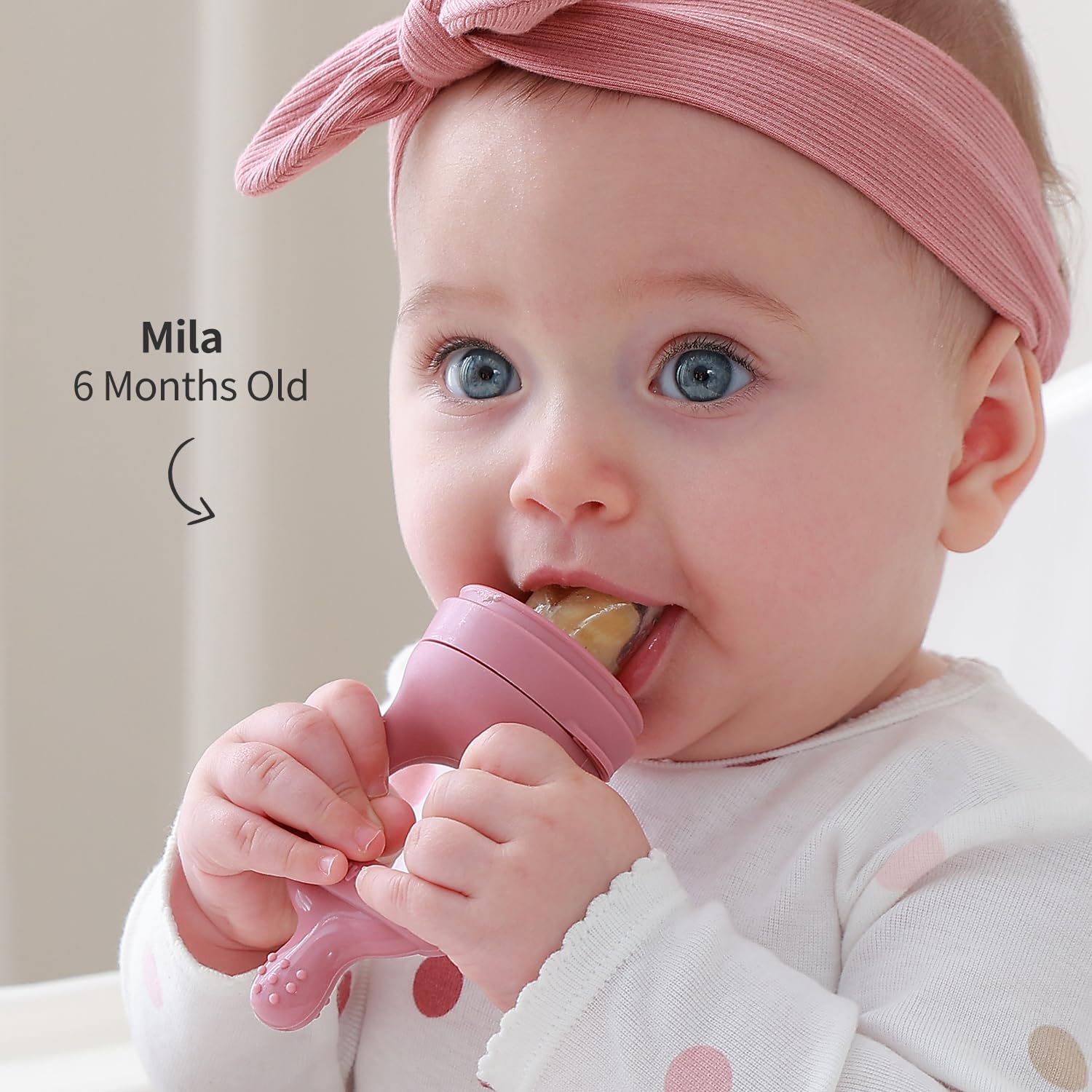 SAMiGO easy-grip feeder design lets little hands hold and explore confidently during feeding