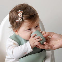 SAMiGO cup features a weighted bottom to reduce spills during use.