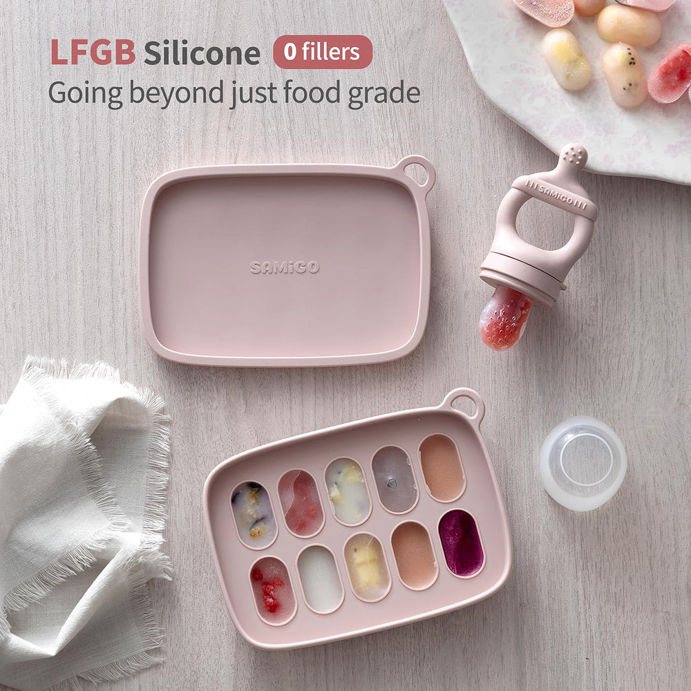 SAMiGO silicone fruit teether held by tiny hands for relief