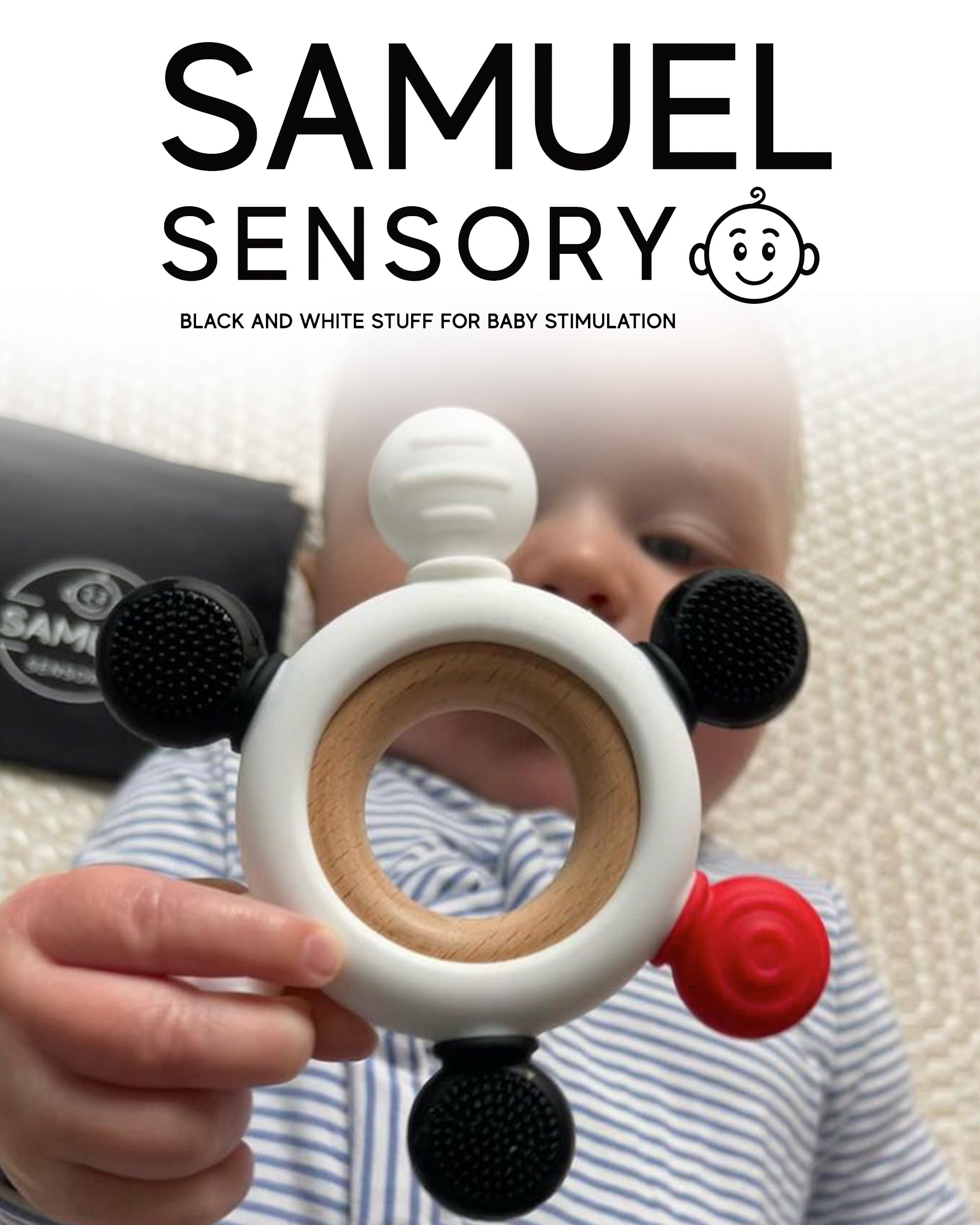 Samuel Sensory teether ring baby using for sensory play.