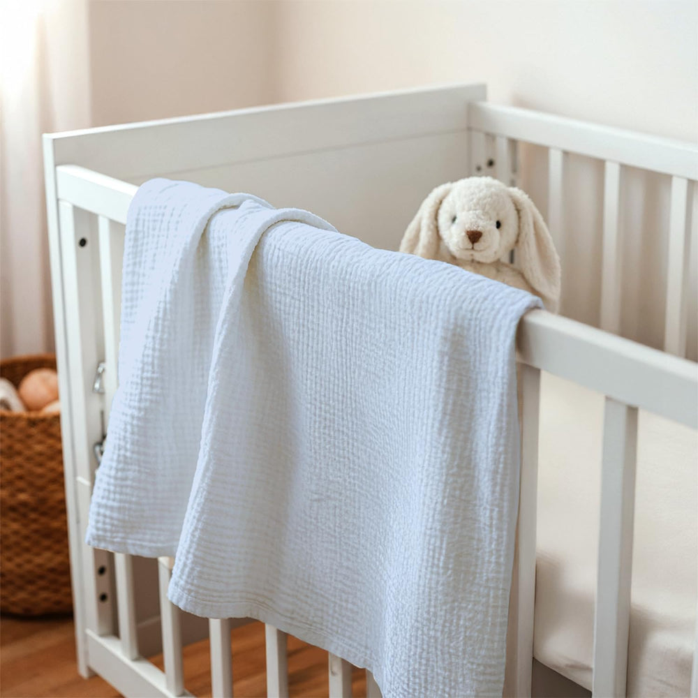 SANDJEST double-sided fabric combines soft muslin and dotted weave for comfort.
