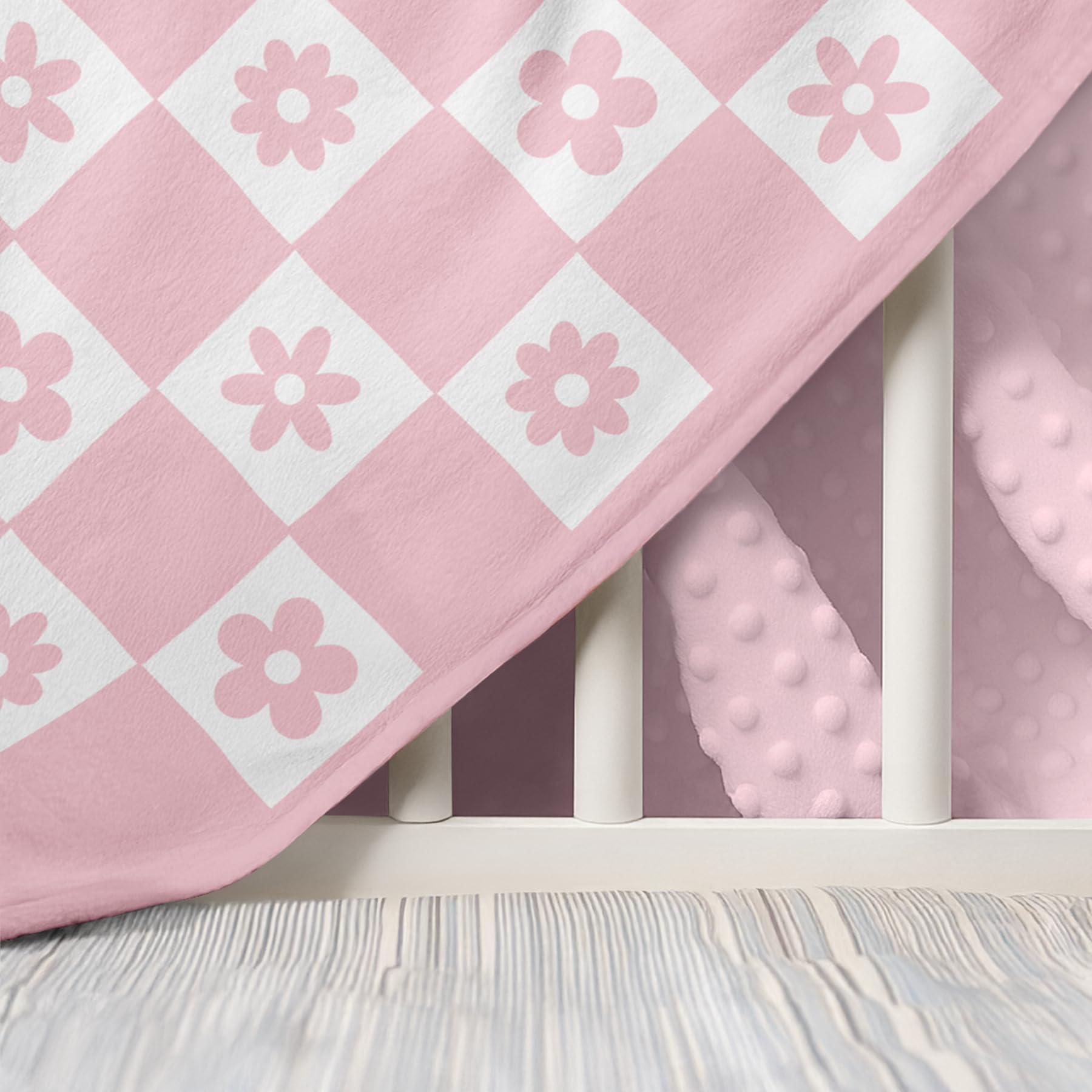 SANDJEST Daisy Minky blanket functioning as a nursing cover for convenience