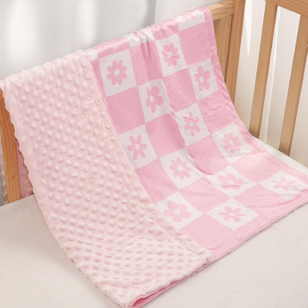 SANDJEST Daisy Minky blanket used as a stroller cover for warmth and shade