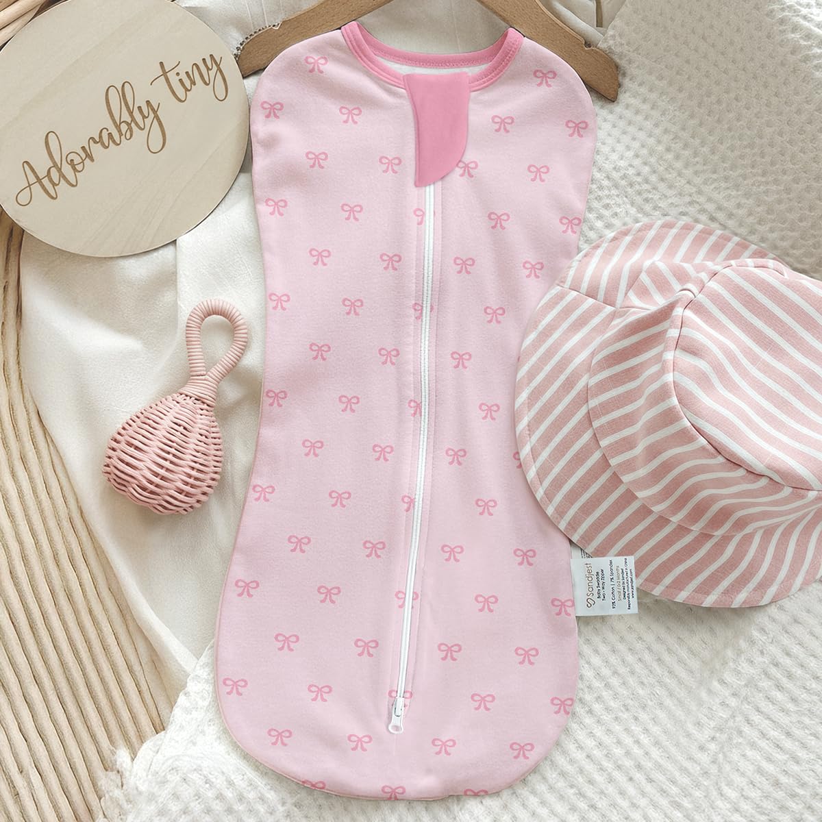 SANDJEST strawberry-pattern swaddle adds playful newborn style to day.