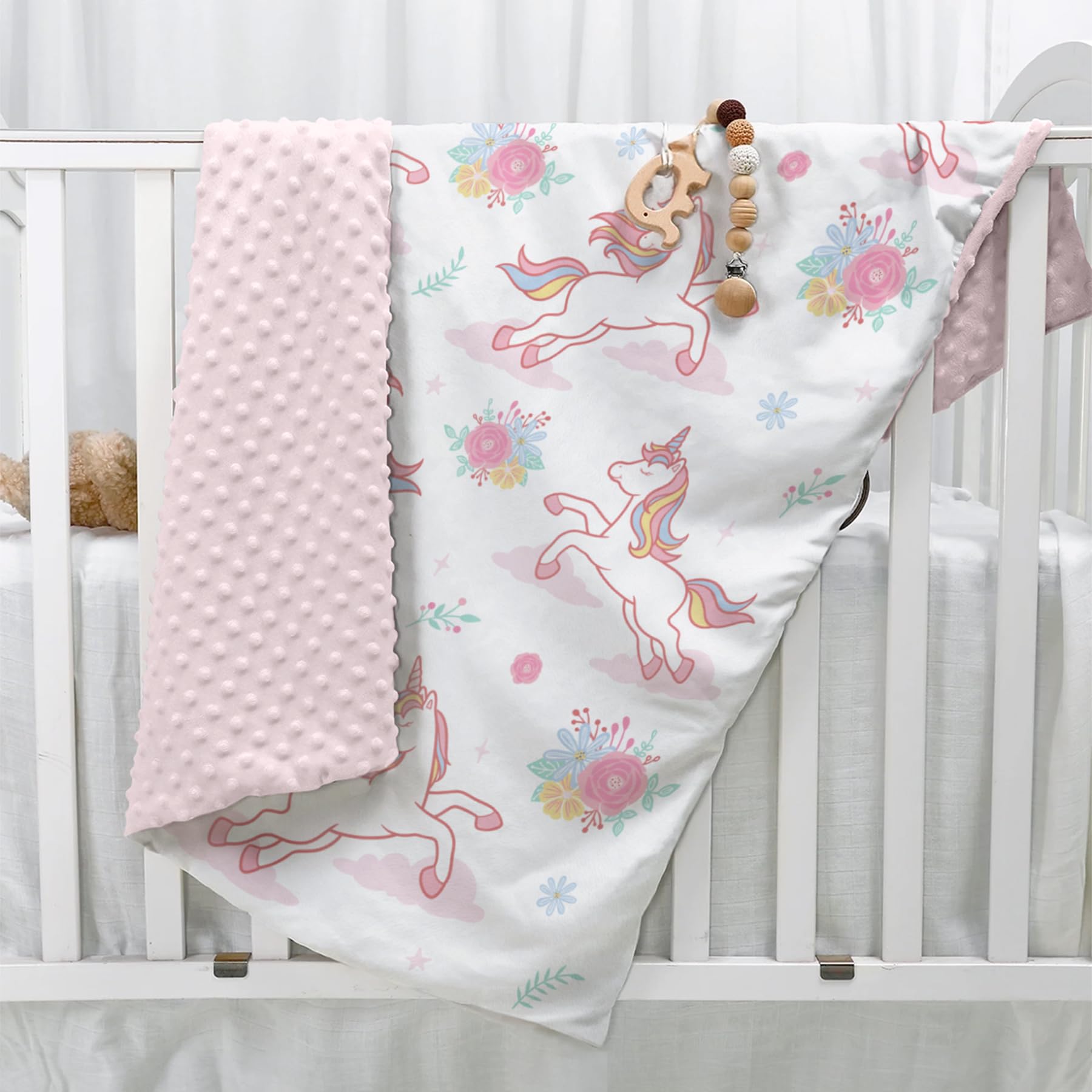 SANDJEST Unicorn Kid Blanket in baby bed illustrating cozy naptime companion
