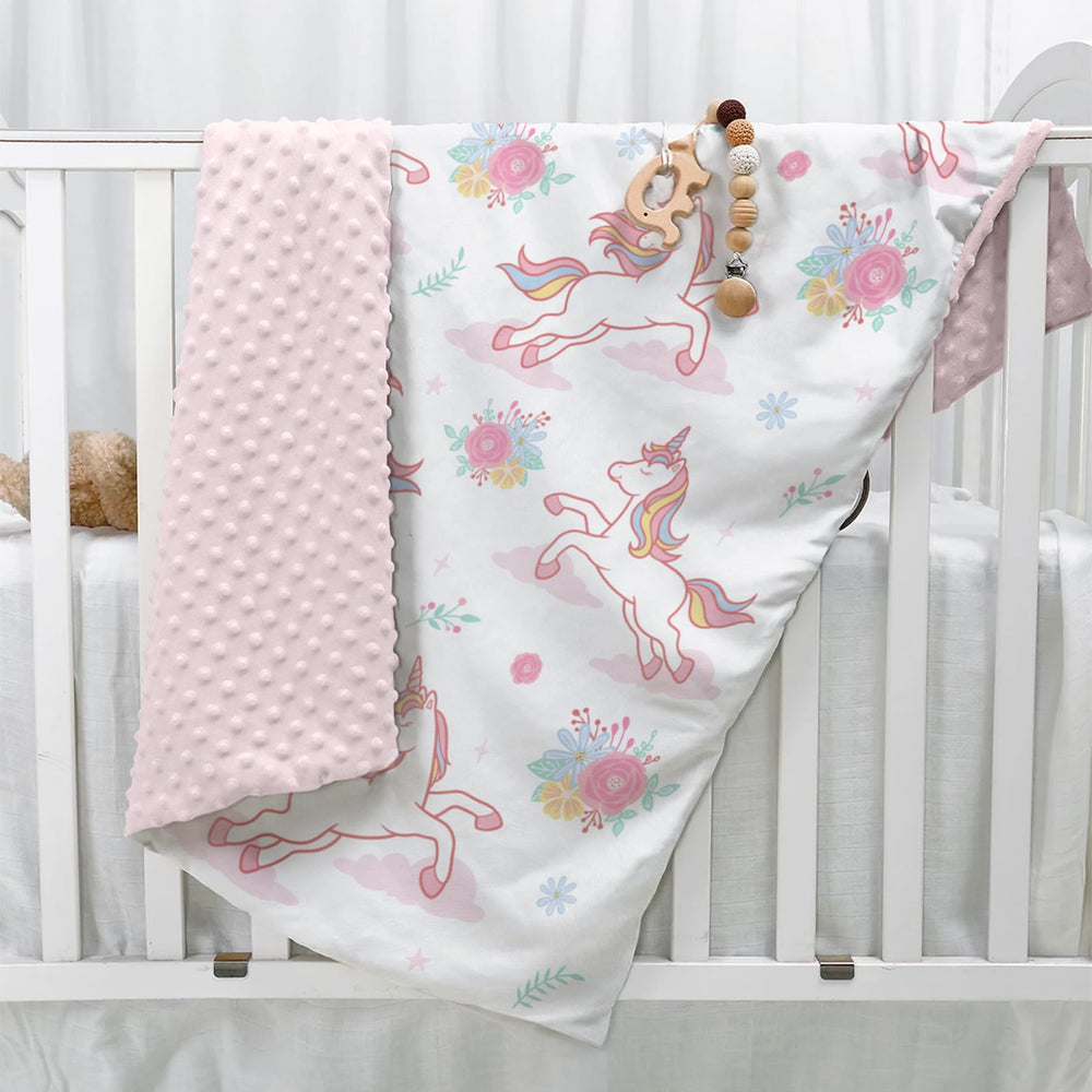 SANDJEST Unicorn Kid Blanket in baby bed illustrating cozy naptime companion