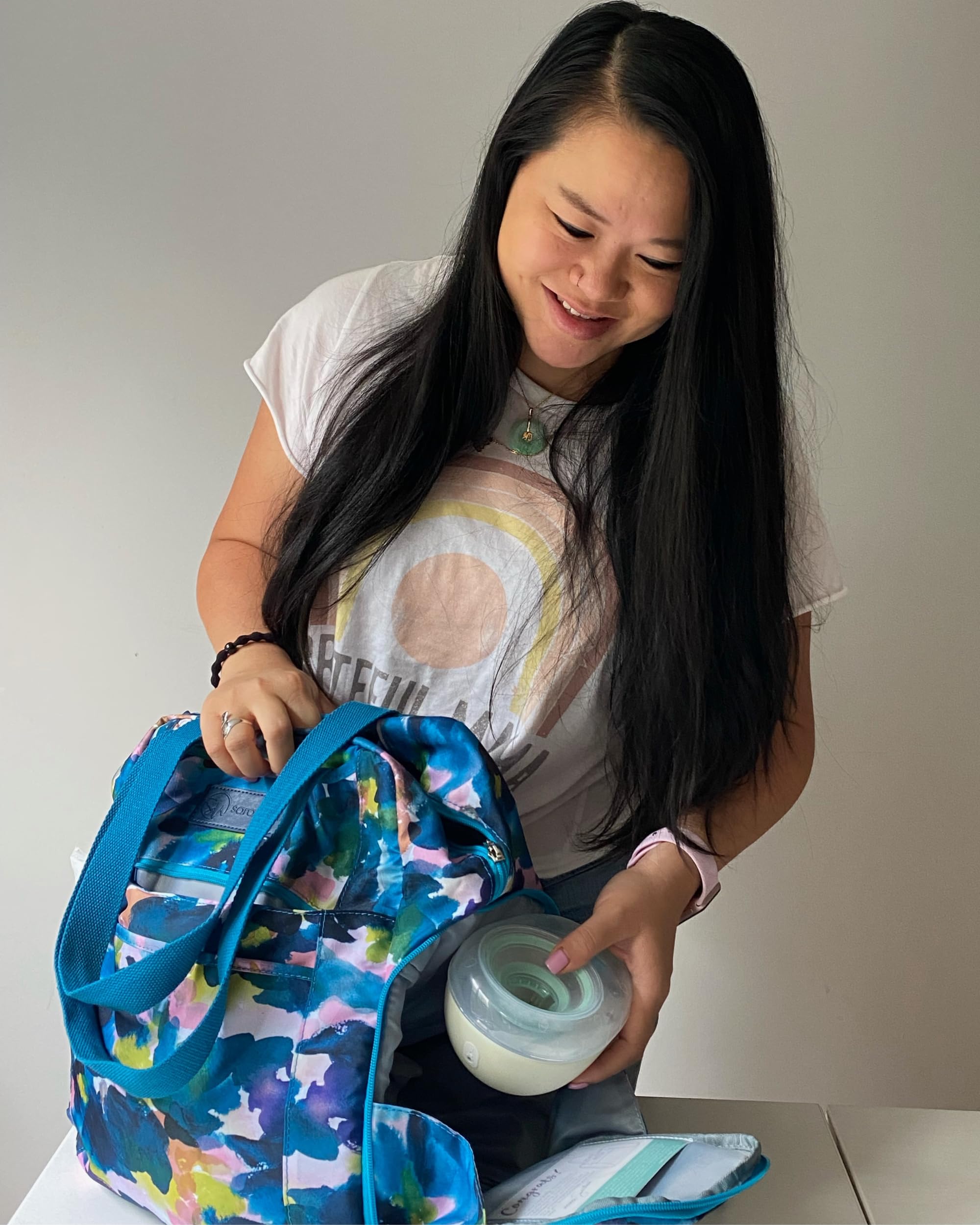 Sarah Wells Kelly side pocket enables easy access to bottles and small items