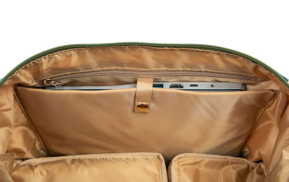 Sarah Wells Lizzy compartments closeup demonstrates pump fit plus accessory organization