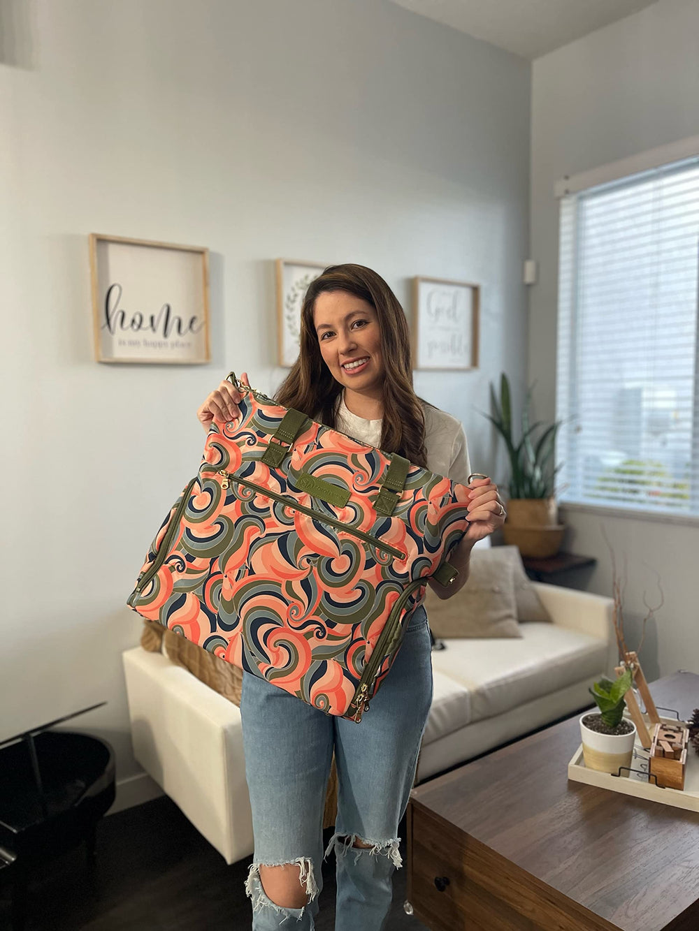 Sarah Wells Lizzy groovy-print detail showcases stylish, versatile nursing bag
