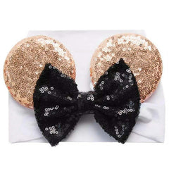 Sarlonter mouse ears headband worn by a toddler, comfortable stretchy fit for birthday celebrations.