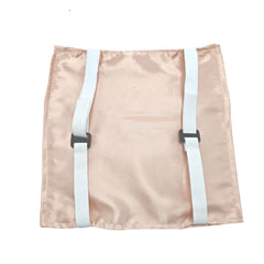 Soft satin surface cushions baby's head for comfortable car rides.