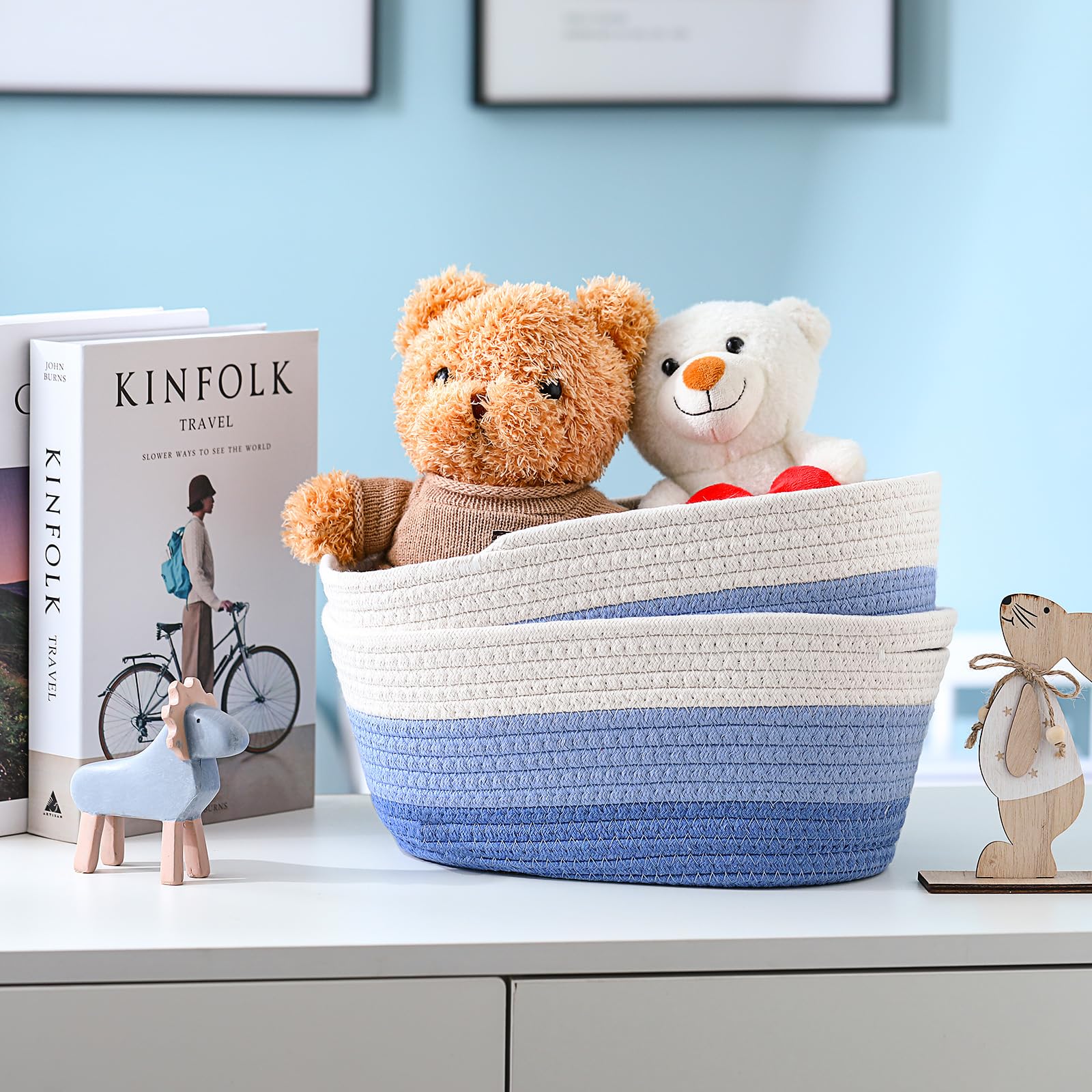 Sawysine blue and white woven baskets on shelf showing tidy bedroom storage.