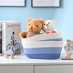 Sawysine blue and white woven baskets on shelf showing tidy bedroom storage.