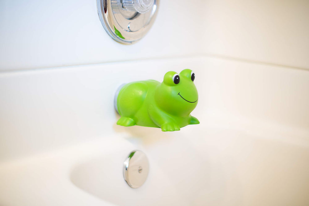S.C. Products Ultra Soft Faucet Guard frog front view protects kids from bumps during bath.