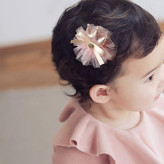 Scettar soft-elastic hair ties offer lightweight hold on baby hair.