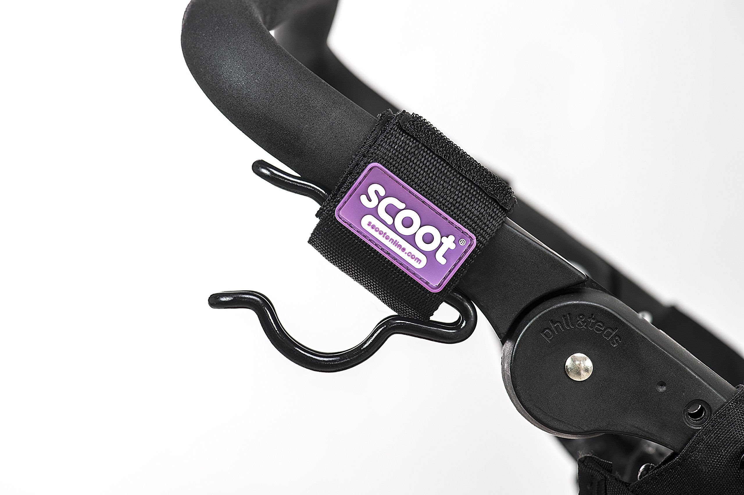SCOOT The Ultimate Buggy Hook on handlebars demonstrates secure two-hook configuration for versatile carrying