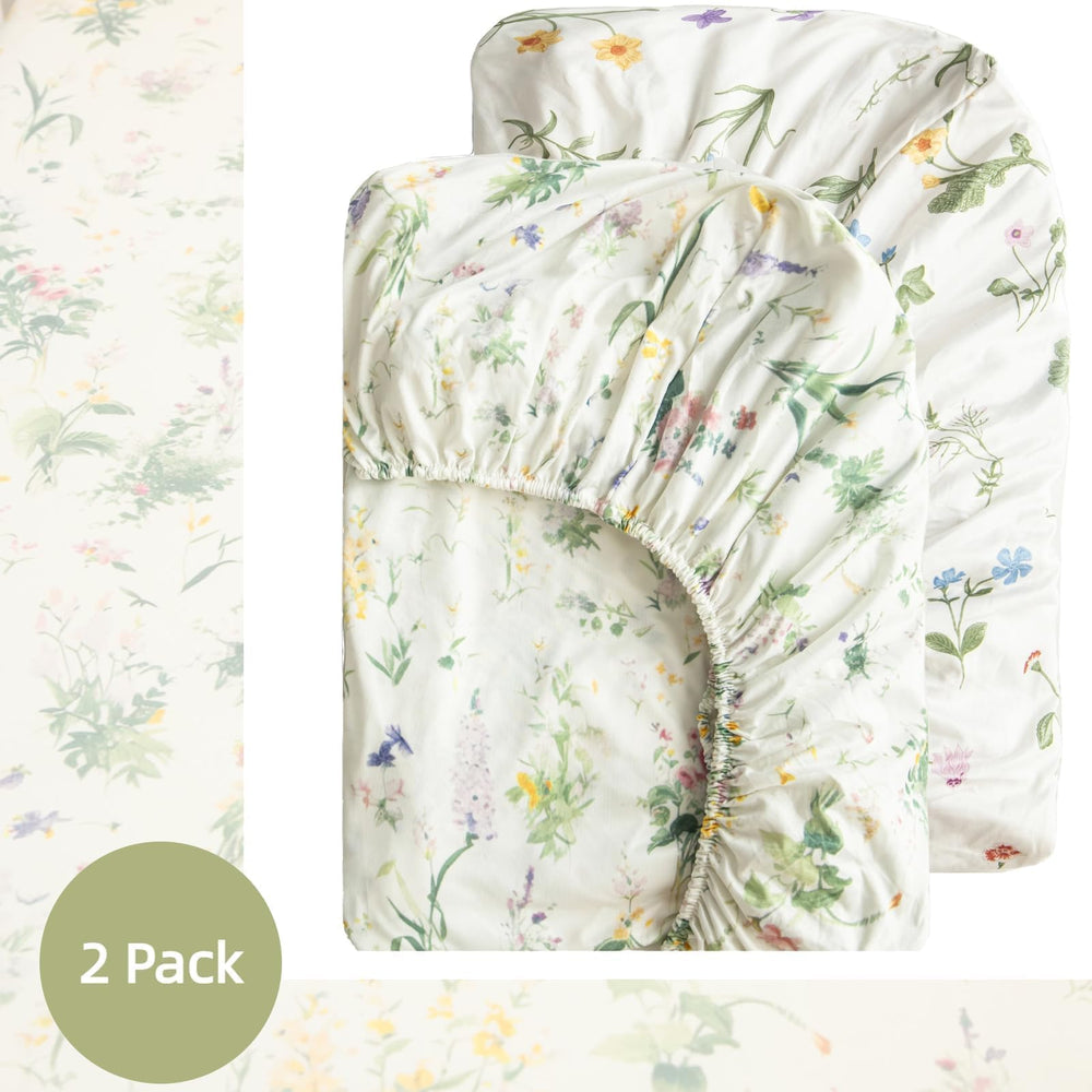 SDIII 2-pack floral crib sheets package signals gift-ready practicality for new parents.