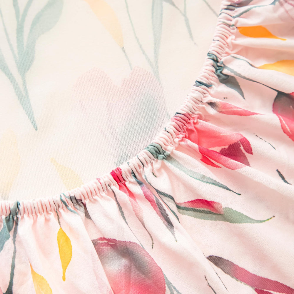 SDIII pink floral crib sheets care-ready for cold wash and tumble dry.