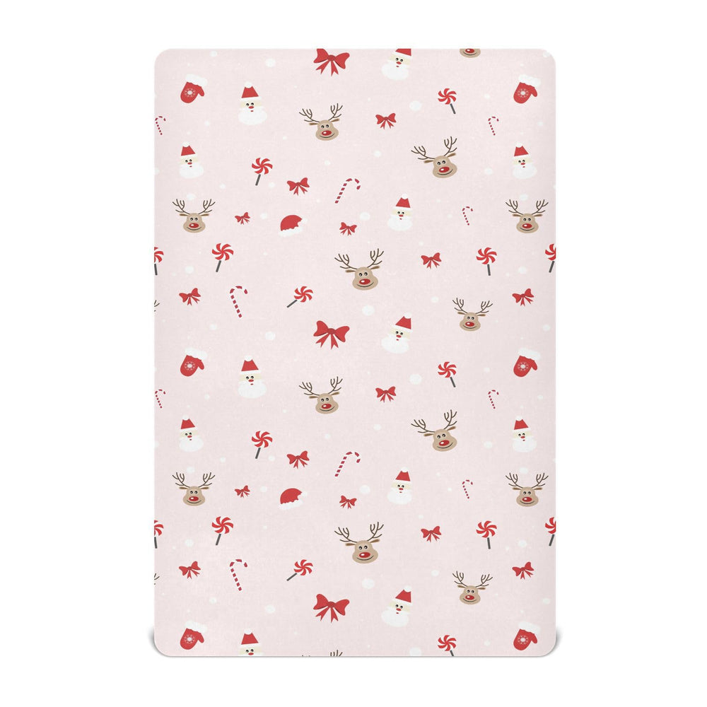 SDMKA Christmas pattern crib sheet 52x28 on mattress with snug elastic fit.